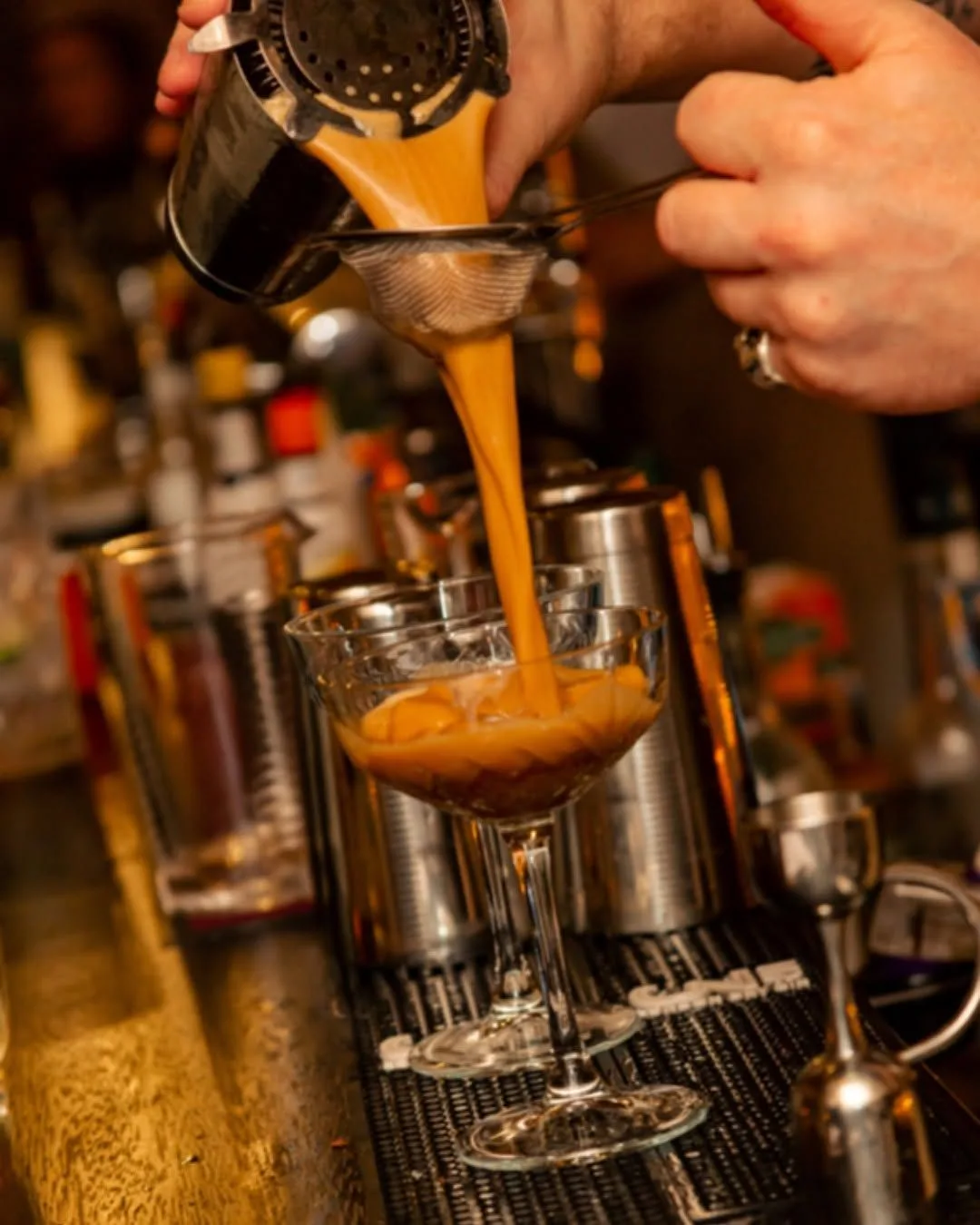 Close up of a cocktail being poured at The Old Workshop, Aberdeen